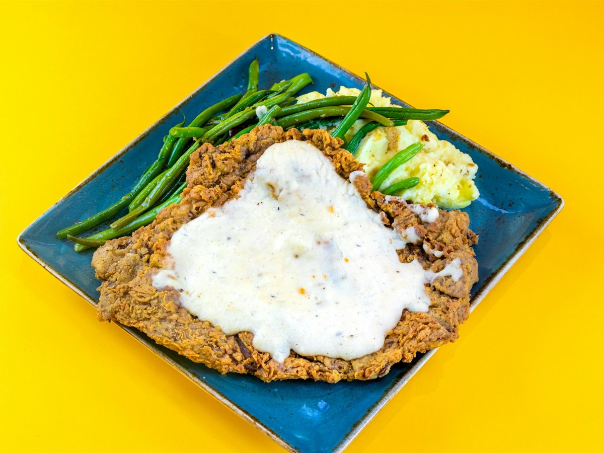 Crispy Country-Fried Pork Chops with Sausage Gravy and Mashed Potatoes
