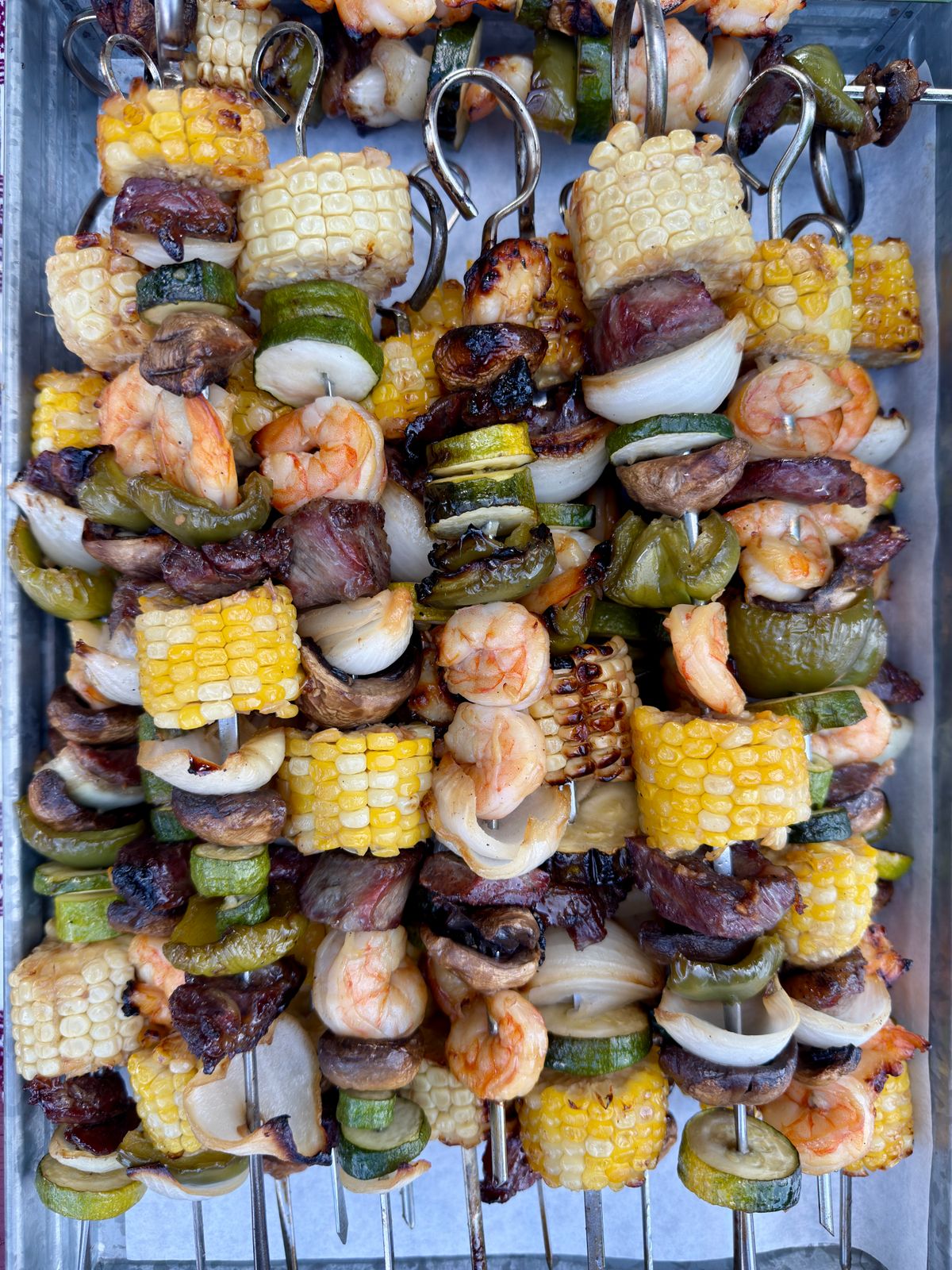 Spicy Grilled Shrimp and Beef Kebabs with Sweet Potato Rounds